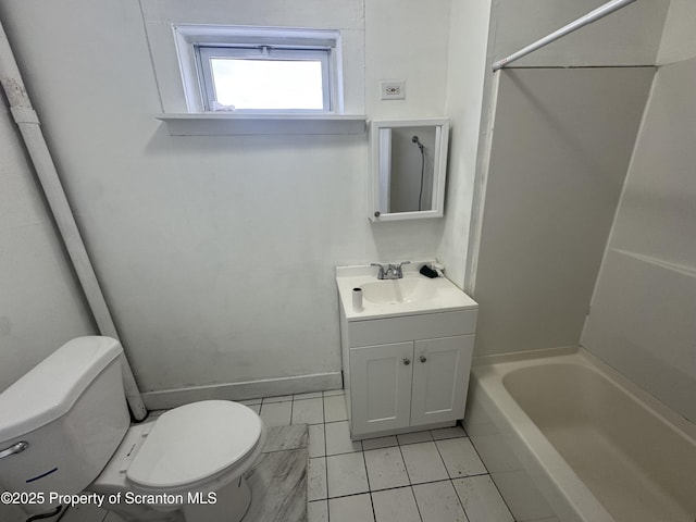 bathroom featuring toilet, tile patterned floors, vanity, baseboards, and shower / washtub combination