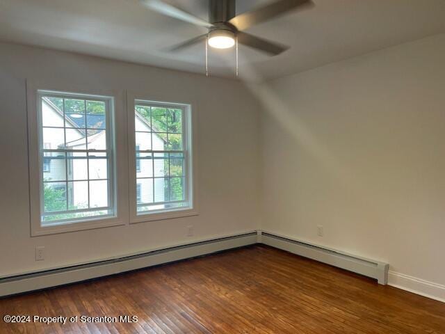 bonus room featuring ceiling fan, dark hardwood / wood-style floors, and baseboard heating