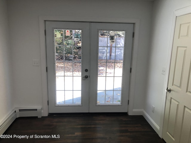 doorway featuring french doors and dark wood-type flooring