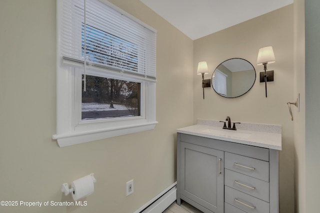 bathroom with vanity and plenty of natural light