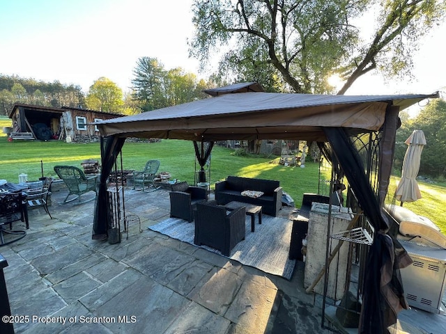 view of patio / terrace with an outdoor hangout area and a gazebo