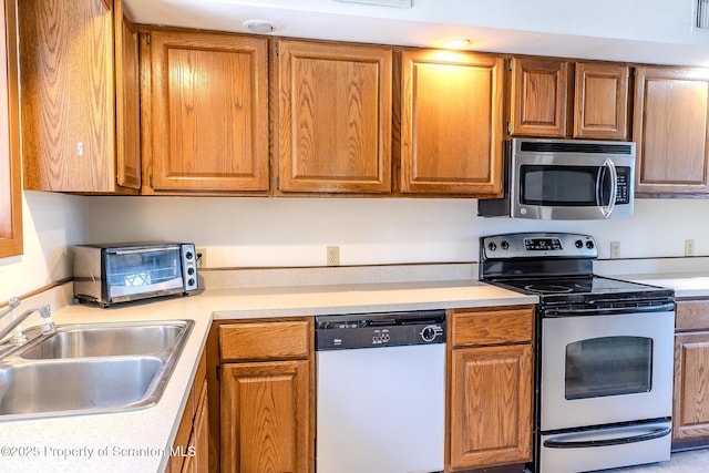 kitchen with sink and stainless steel appliances