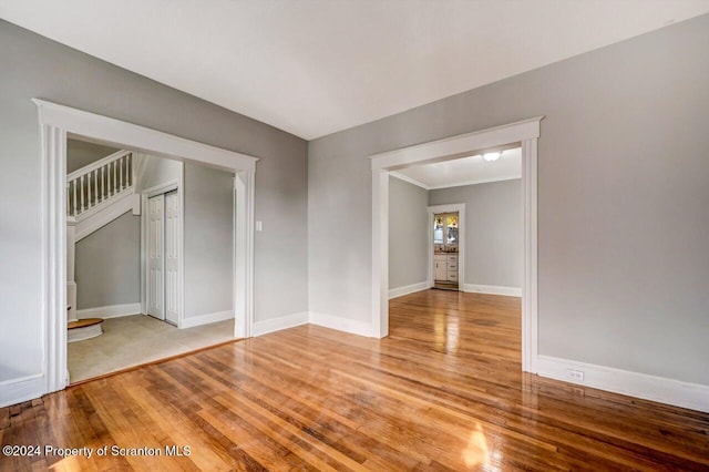 unfurnished room with light hardwood / wood-style floors