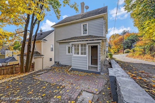 rear view of house featuring a patio area