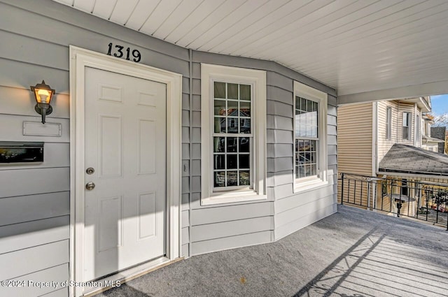 entrance to property with a porch