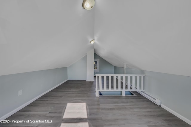 bonus room featuring hardwood / wood-style floors and lofted ceiling