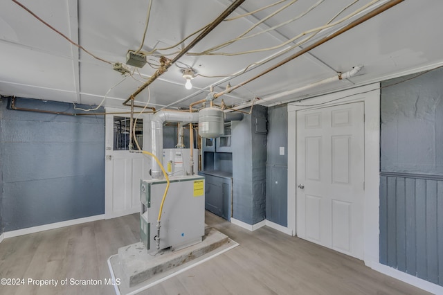 basement featuring light wood-type flooring