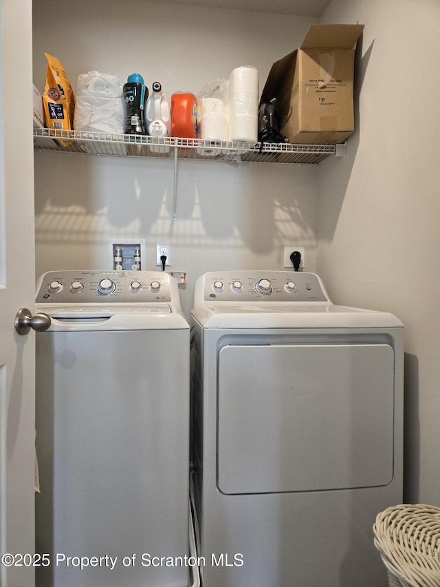 washroom featuring independent washer and dryer