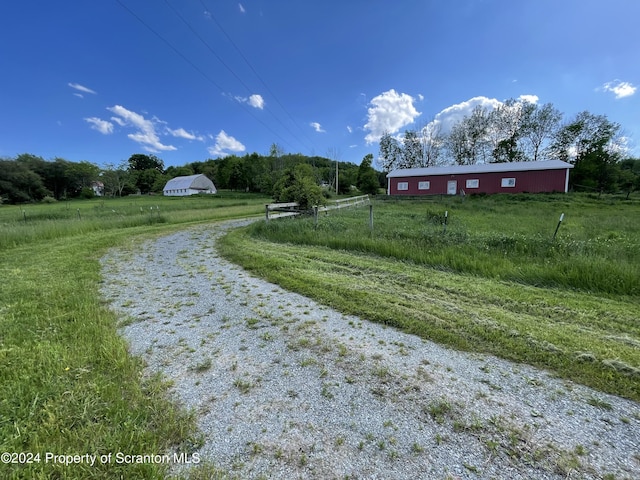 view of road featuring a rural view