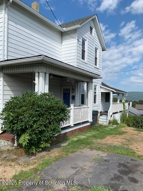 view of front of house with covered porch