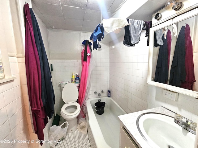 510 Moltke Ave, Scranton, PA 18505 - bathroom featuring tile walls, vanity, toilet, and tile patterned flooring