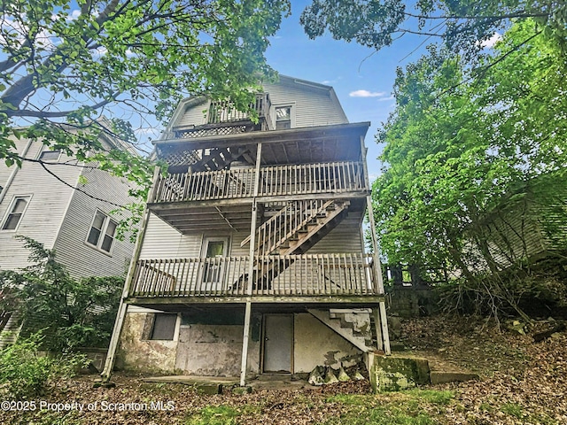 510 Moltke Ave, Scranton, PA 18505 - back of property with stairs, a gambrel roof, and a wooden deck