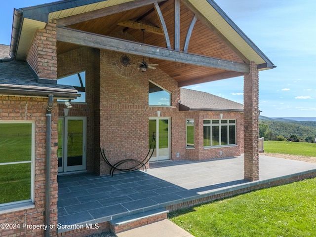 view of patio / terrace featuring ceiling fan