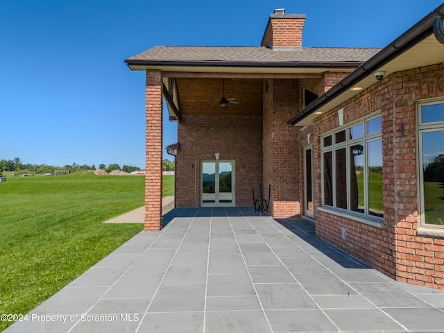 view of patio / terrace featuring ceiling fan