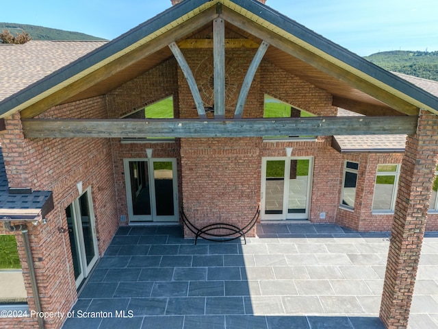 back of house with a patio area