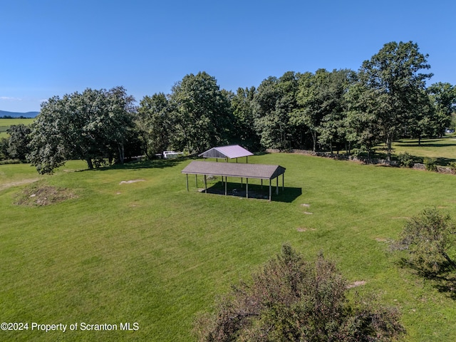 view of home's community featuring a lawn