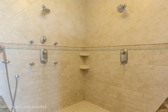 bathroom featuring tiled shower