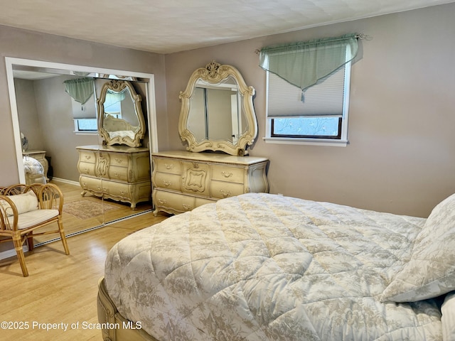 102 Bubernak Blvd, Old Forge, PA 18518 - bedroom with multiple windows and light wood-style flooring