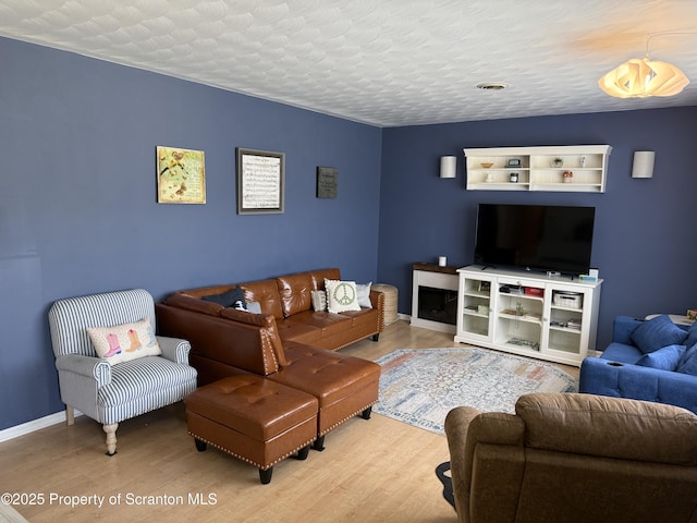 102 Bubernak Blvd, Old Forge, PA 18518 - living area featuring wood finished floors and baseboards