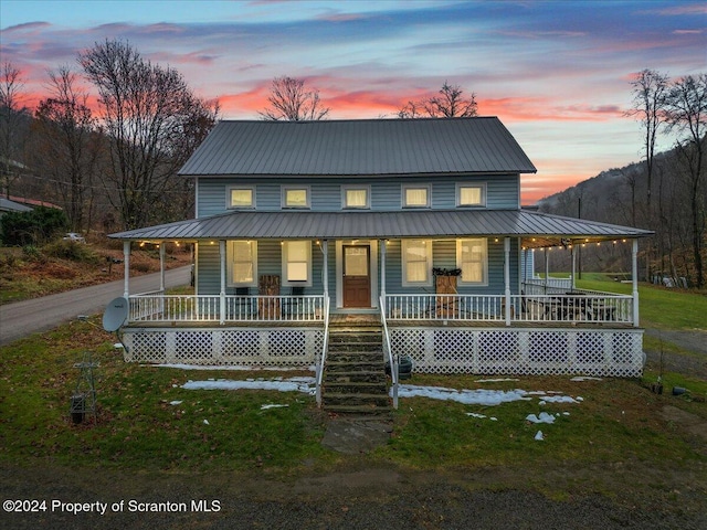 farmhouse-style home with a porch