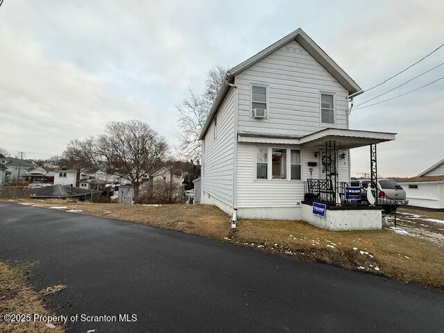 front of property featuring a porch