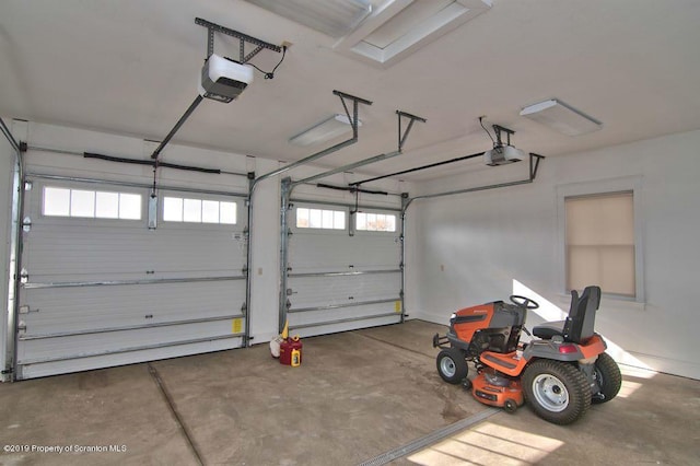 garage featuring a garage door opener