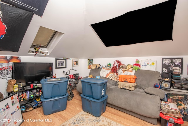 recreation room featuring light hardwood / wood-style floors