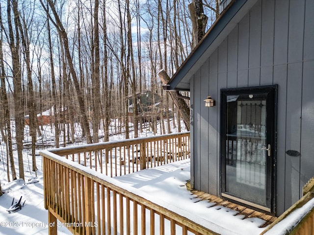 view of snow covered deck