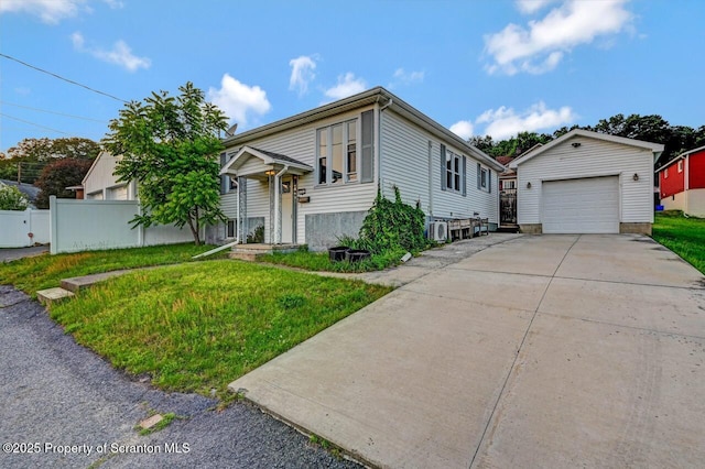 211 Hill St, Dupont, PA 18641 - view of front of house featuring an outdoor structure, a garage, and driveway