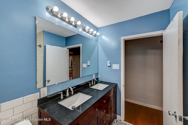 211 Hill St, Dupont, PA 18641 - bathroom with double vanity and wood finished floors