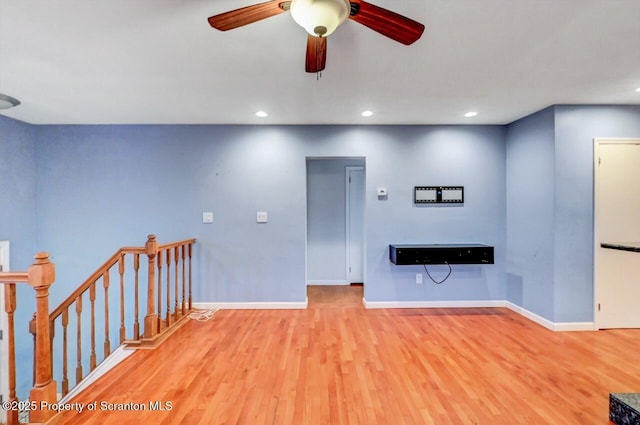 211 Hill St, Dupont, PA 18641 - unfurnished living room with wood finished floors, recessed lighting, and a ceiling fan
