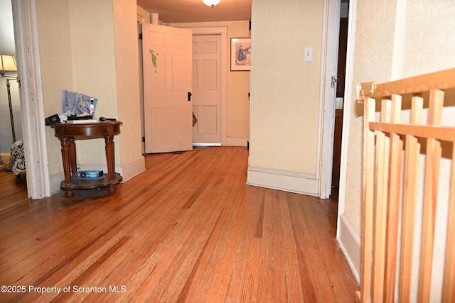 hall featuring wood-type flooring