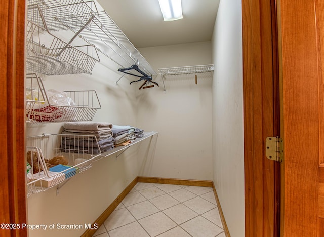 72 Adams Dr, Waymart, PA 18472 - walk in closet with light tile patterned floors