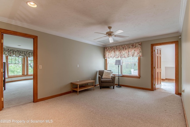72 Adams Dr, Waymart, PA 18472 - sitting room featuring light colored carpet, a ceiling fan, and ornamental molding