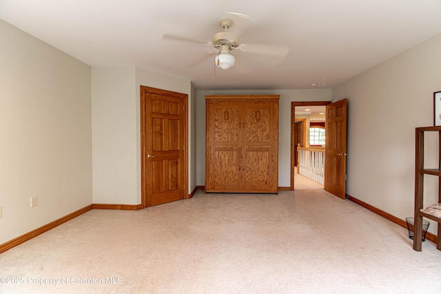 72 Adams Dr, Waymart, PA 18472 - unfurnished bedroom featuring light colored carpet and ceiling fan