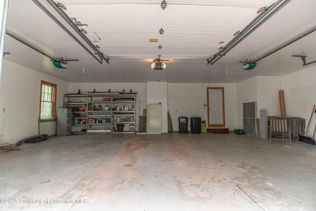 72 Adams Dr, Waymart, PA 18472 - garage with a garage door opener