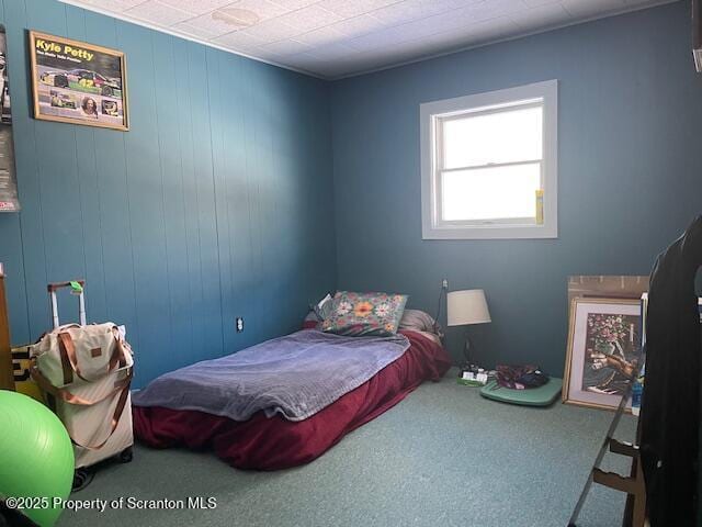 bedroom featuring carpet