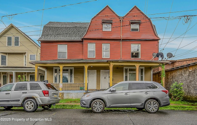 167 S Hyde Park Ave, Scranton, PA 18504 - view of front of property featuring a gambrel roof, a porch, and roof with shingles