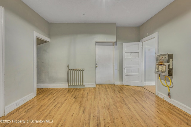 167 S Hyde Park Ave, Scranton, PA 18504 - unfurnished bedroom with heating unit and light wood finished floors