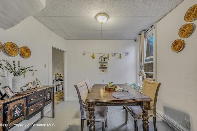 167 S Hyde Park Ave, Scranton, PA 18504 - dining area featuring a drop ceiling and light wood finished floors