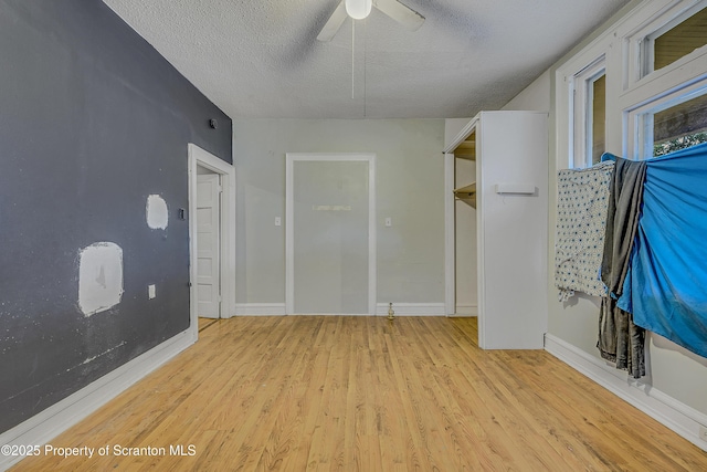 167 S Hyde Park Ave, Scranton, PA 18504 - unfurnished room with wood finished floors, a ceiling fan, and a textured ceiling