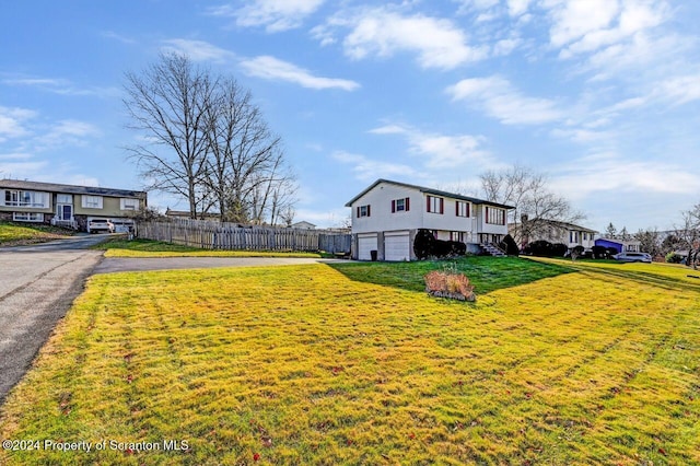 view of yard with a garage