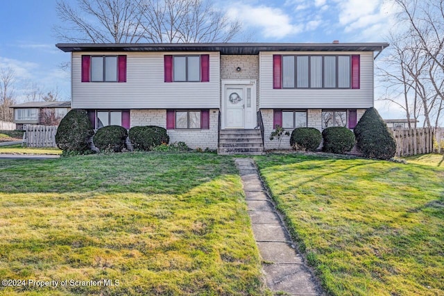 view of front of property with a front lawn