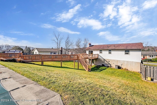 view of yard with a deck