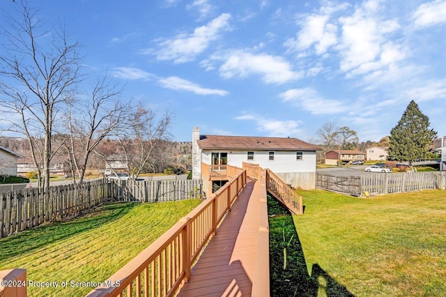 rear view of property featuring a yard