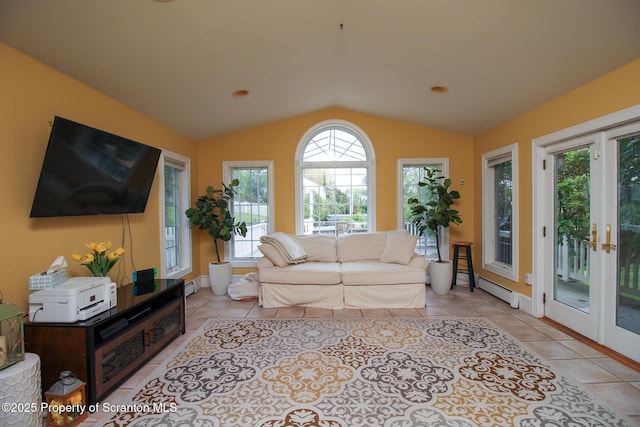 525 N Abington Rd, Waverly Twp, PA 18411 - living room with lofted ceiling, light tile patterned flooring, and baseboard heating