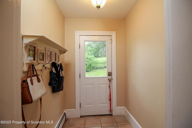 525 N Abington Rd, Waverly Twp, PA 18411 - doorway to outside with light tile patterned floors, baseboards, and baseboard heating