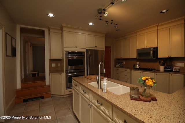 525 N Abington Rd, Waverly Twp, PA 18411 - kitchen with appliances with stainless steel finishes, a sink, recessed lighting, light tile patterned floors, and light stone counters