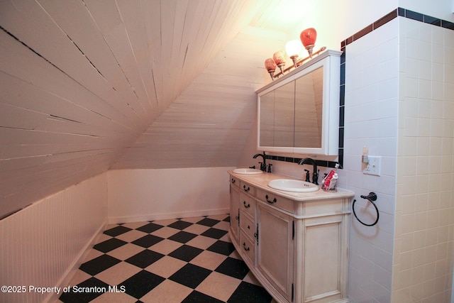 525 N Abington Rd, Waverly Twp, PA 18411 - full bathroom featuring tile patterned floors, double vanity, and wooden ceiling