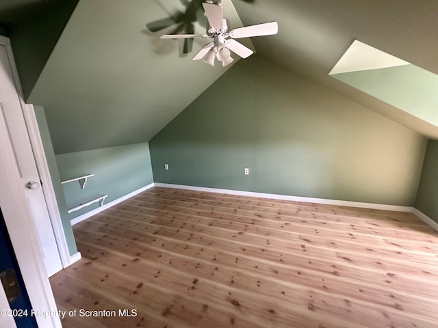 bonus room with ceiling fan, lofted ceiling, and light hardwood / wood-style flooring